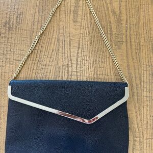 Henri Bendel Leather Clutch Black with Gold Trim and Chain